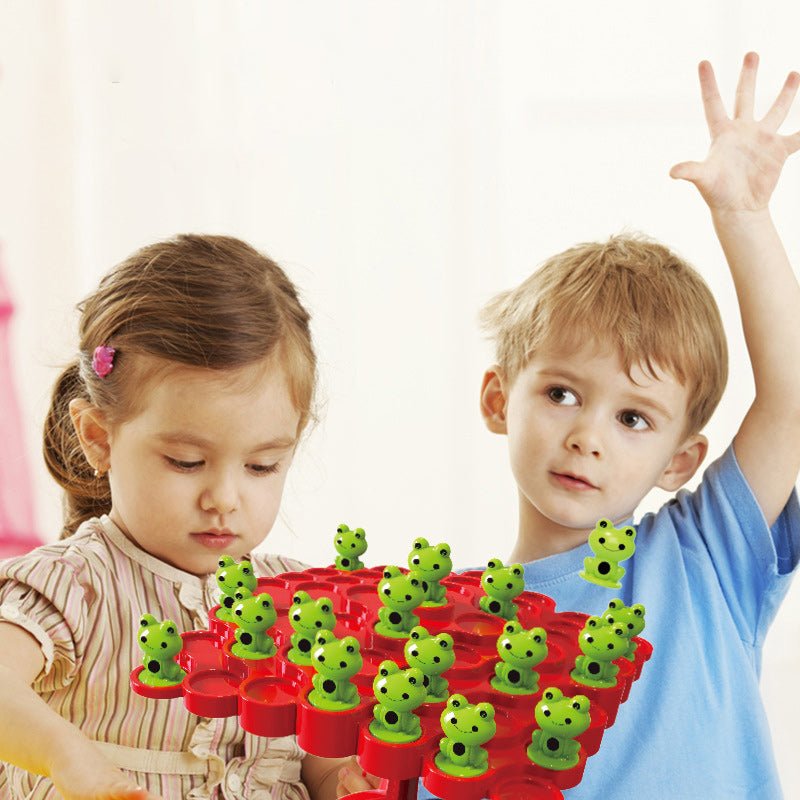 Schattig balansspel met kikkers voor plezier en leren.