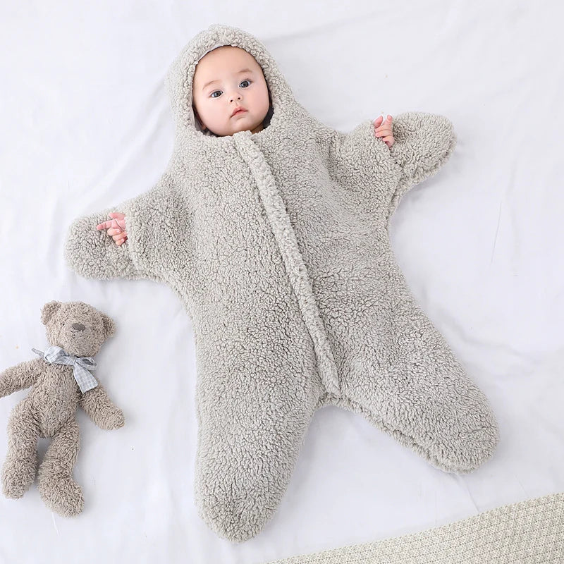 StarGlow babywikkeldeken, speciaal gemaakt voor pasgeborenen om maximale veiligheid en comfort te garanderen.


