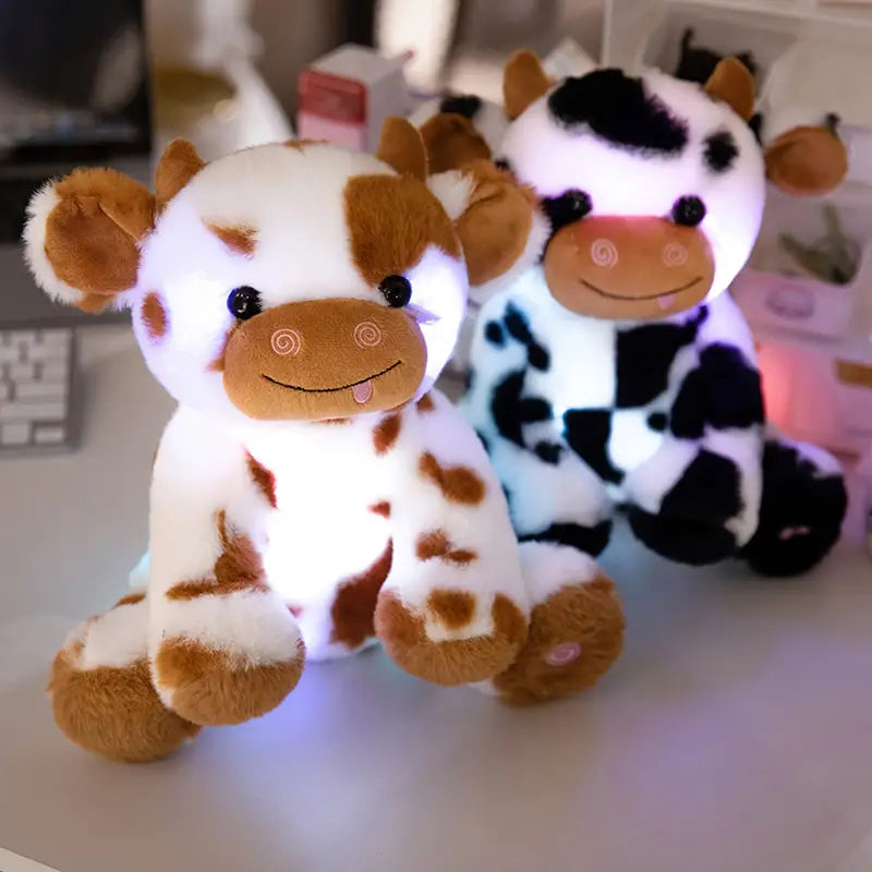 LumiCow - Knuffel Koe Met LED Verlichting, een lieve metgezel voor kinderen die licht en liefde brengt.