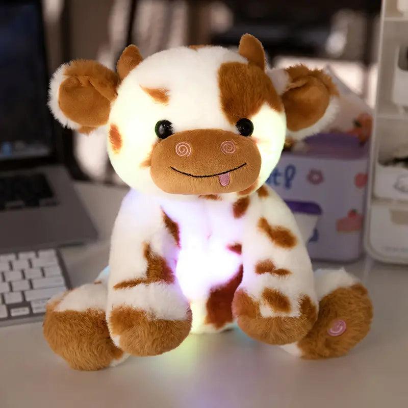 LumiCow - Knuffel Koe Met LED Verlichting, een perfecte combinatie van knuffelbaar speelgoed en zachte verlichting.