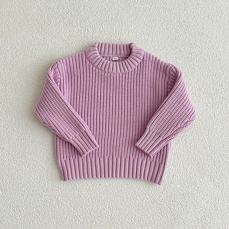Luna knusse gebreide trui voor kinderen, perfect voor een gezellige winterlook.
