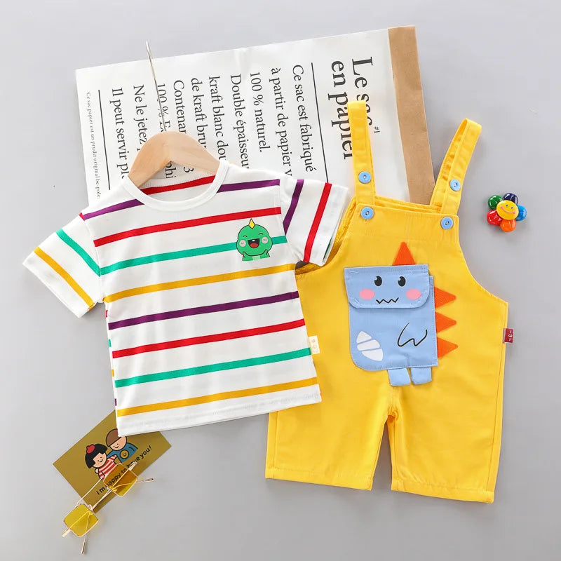 T-shirt met regenboogstrepen en dino-print.