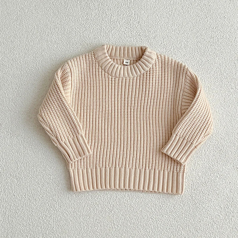 Luna zachte gebreide trui voor kinderen, ideaal voor het combineren met andere outfits.
