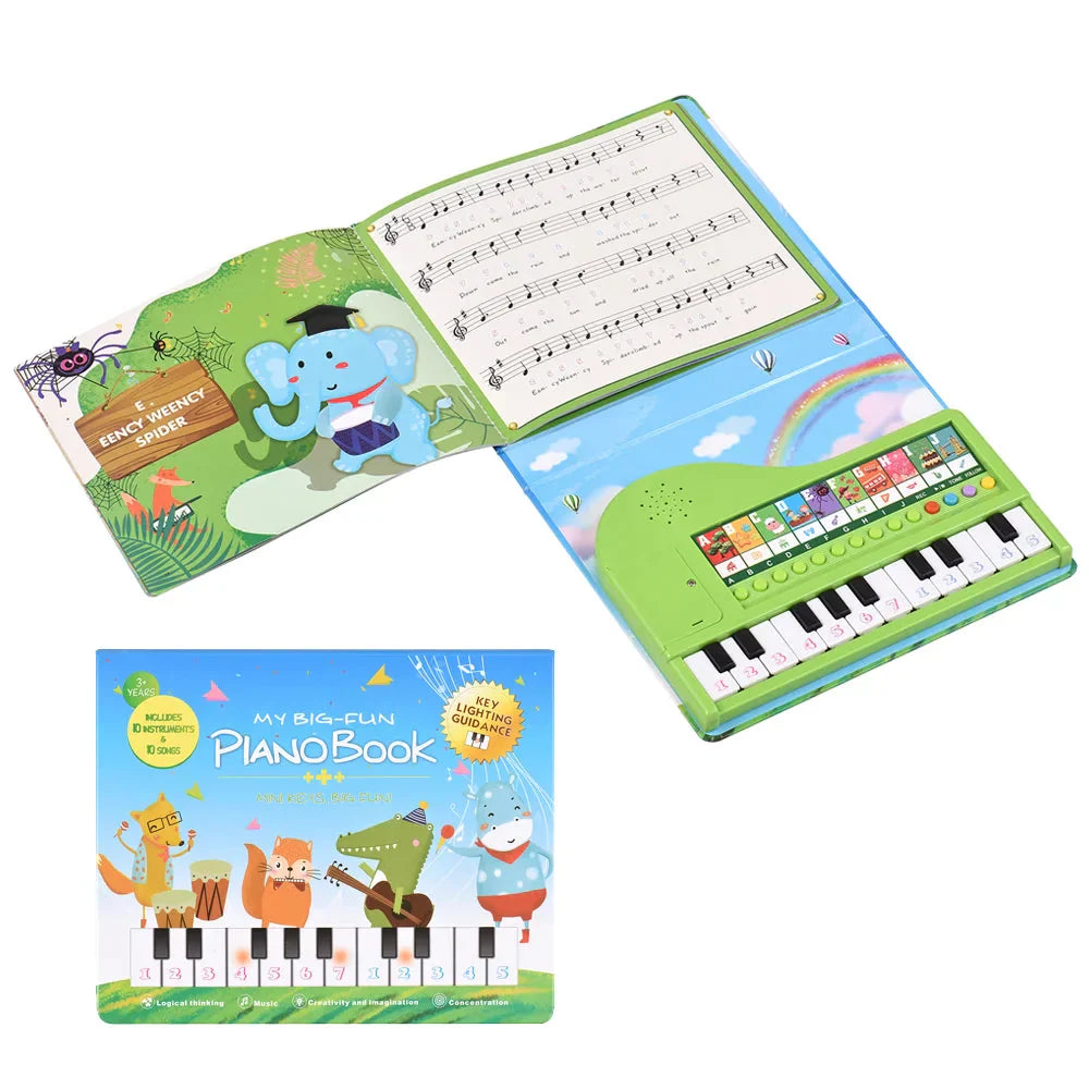 Kinder piano boek met lichtgevende toetsen gesloten op tafel.