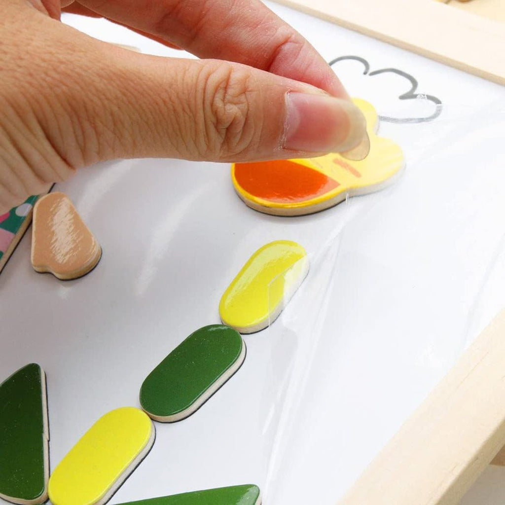 Illustratie van "CreativityBox - Magnetisch Houten Tekenbord En Puzzelset Voor Kinderen", ideaal voor het ontwikkelen van artistieke en motorische vaardigheden.