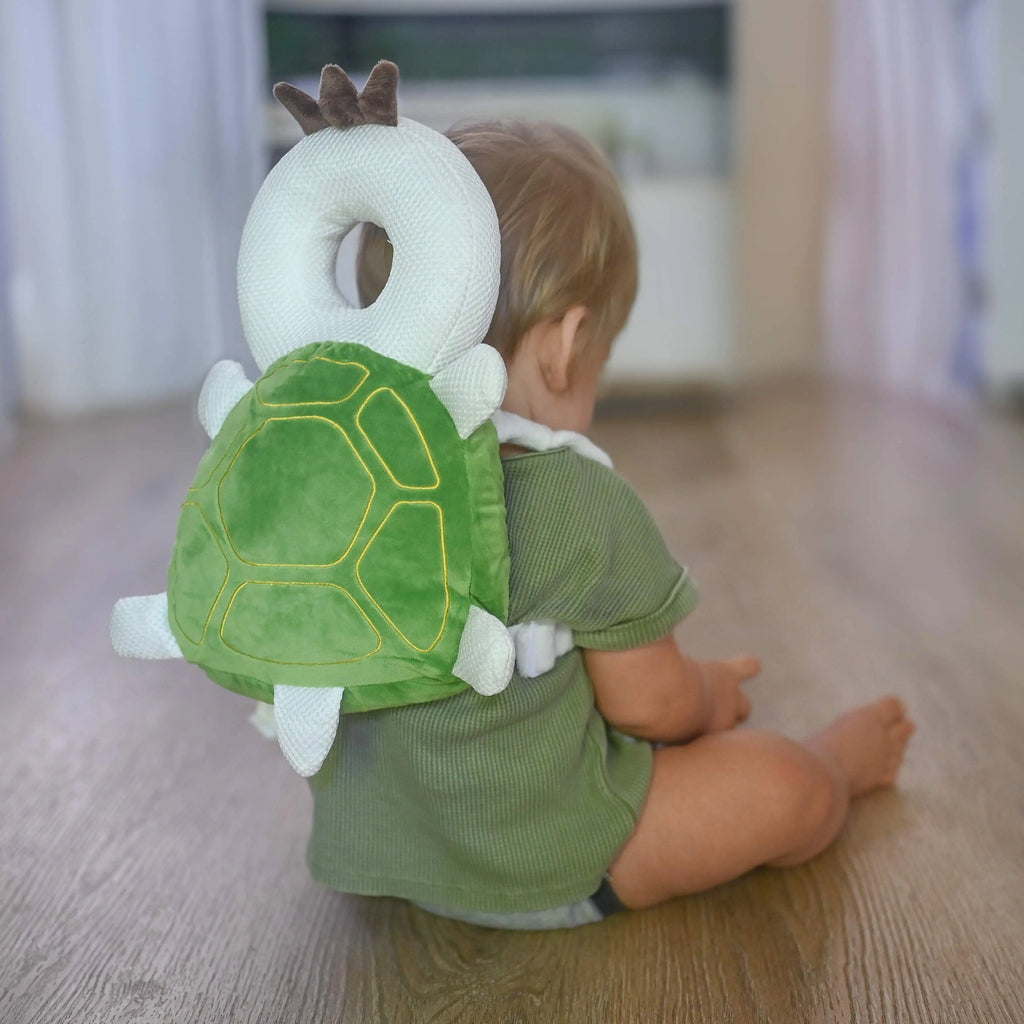 Zacht babyhoofdkussen ontworpen voor comfort en bescherming tijdens het spelen en kruipen.